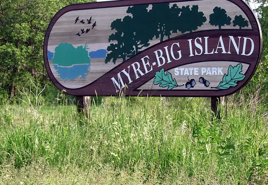Trail view on Big Island surrounded by trees and lake