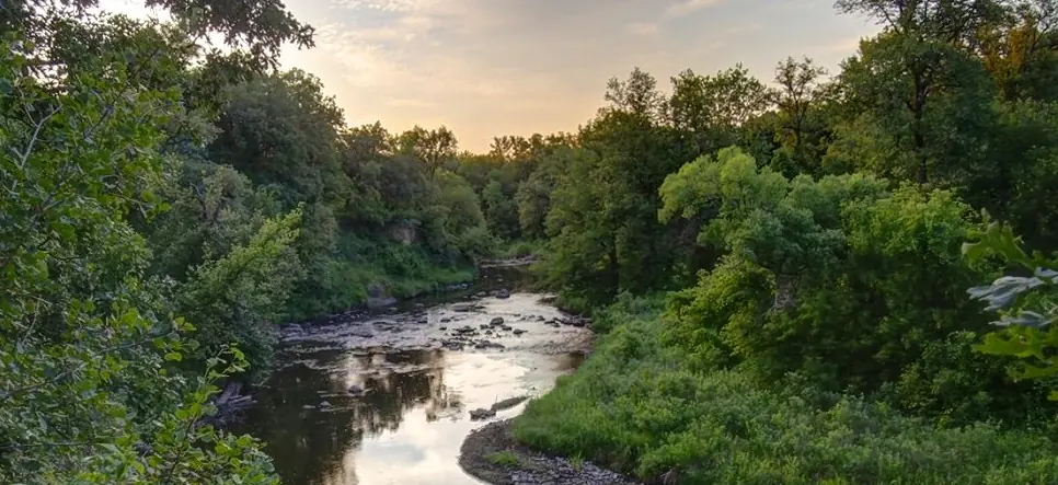 Tallgrass prairie at Buffalo River State Park under a wide blue sky
